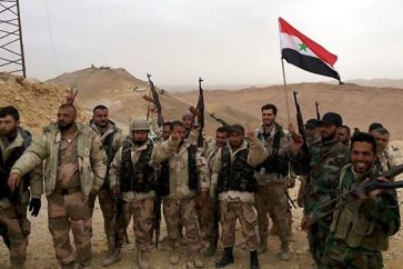 عناصر من الجيش السوري في مدينة تدمر