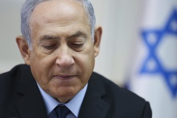 Israeli Prime Minister Benjamin Netanyahu chairs the weekly cabinet meeting at the Prime Minister office in Jerusalem, Sunday, Oct. 28, 2018. (AP Photo/Oded Balilty, Pool)