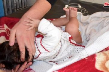 Un bébé blessé par l'agression israélienne contre Hama